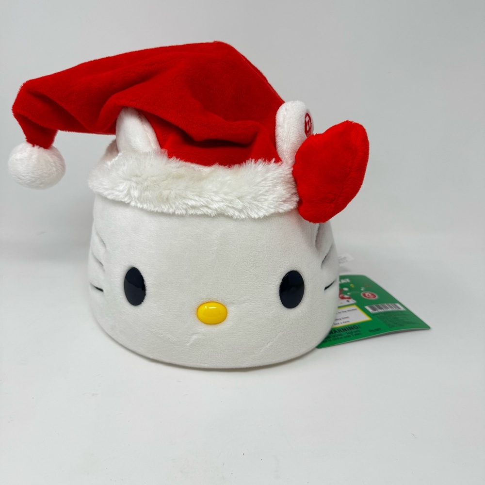 NWT’ HELLO KITTY Dancing Santa Moving Hat! Plays 5 songs!